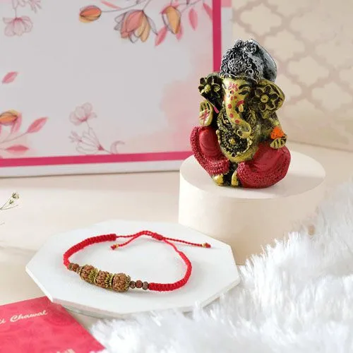 Divine Rudraksha Rakhi & Ganpati Idol Set