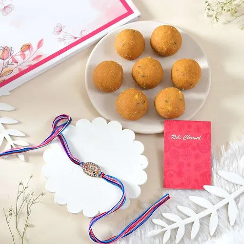 Elegant Rakhi with Sweet Besan Ladoo