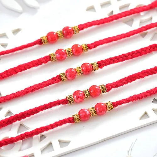 Radiant Red Beaded Rakhi Set