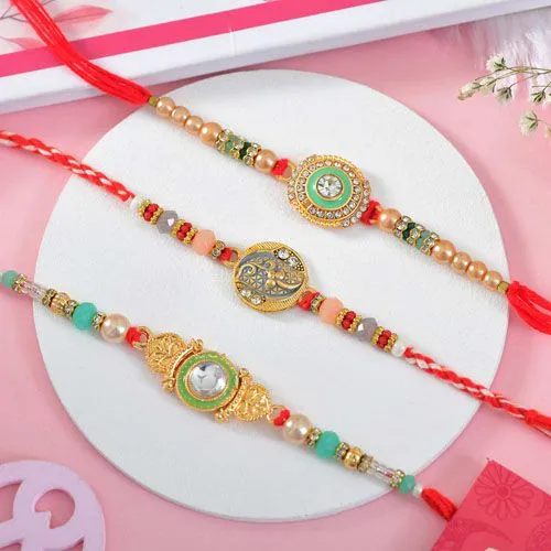 Elegant Kundan Rakhi Trio