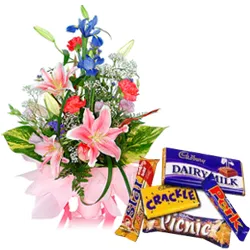 Seasonal Flowers Arrangement with Assorted Cadbury Chocolates