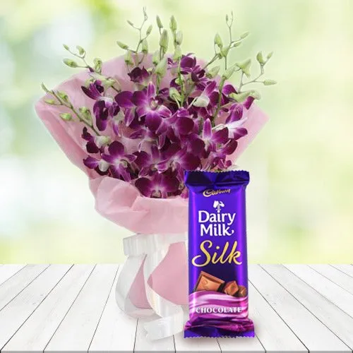 Order Combo of Orchids Bouquet and Dairy Milk Silk