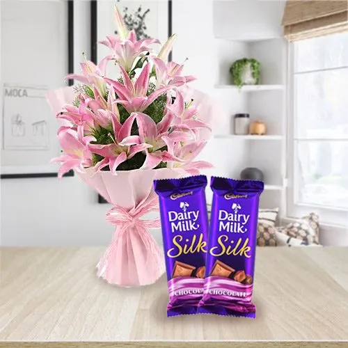 Wonderful Oriental Pink Lilies Bouquet with Dairy Milk Silk