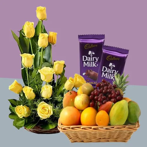 Gift of Mixed Fruits Basket with Roses Arrangement and Dairy Milk Silk