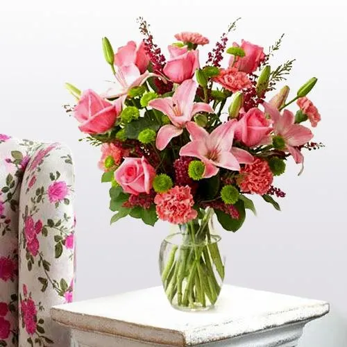 Lovely Arrangement of Lilies Roses and Carnations