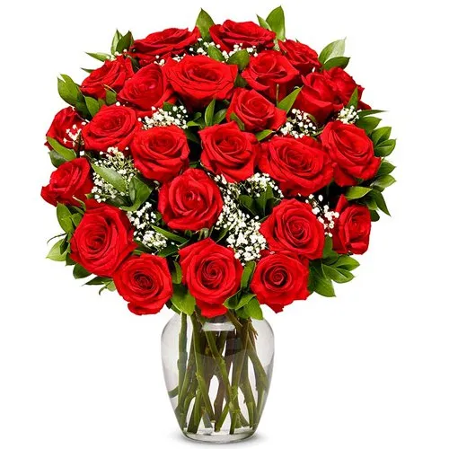 Bright Red Roses in a Glass Vase