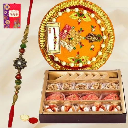 Assorted Sweets from Haldiram and Rakhi Thali along Rakhi Roli Tilak and Chawal