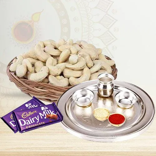 Traditional Silver Thali and Cashew Nuts with Dairy Milk