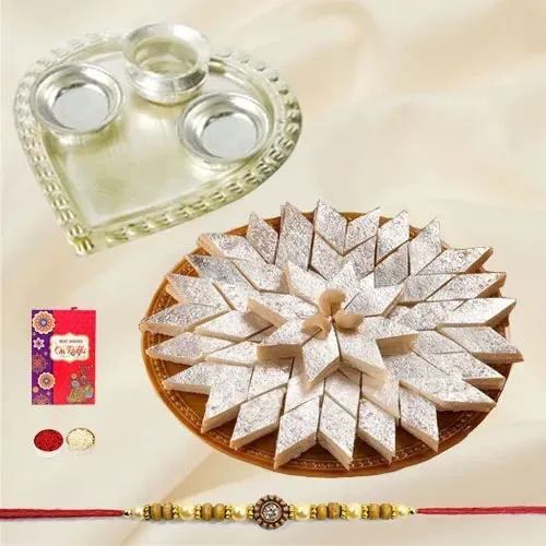 Rakhi with Haldirams Kaju Katli and SIlver Plated Paan Shaped Puja Thali