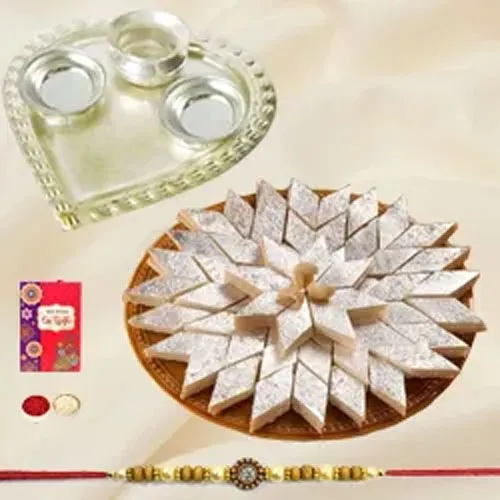 Kaju Katli from Haldiram and Silver Plated Paan Shaped Puja Aarti Thali along with Rakhi