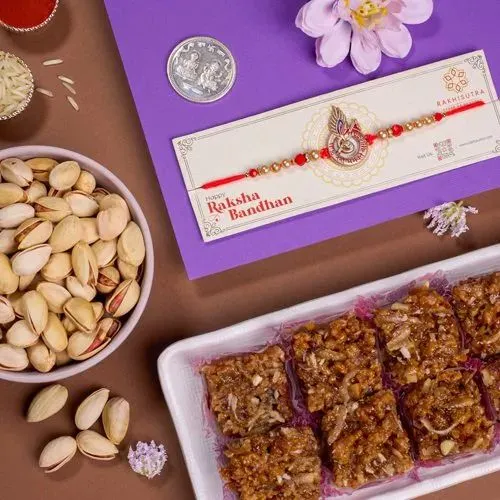 Magnificent Rakhi with Dodha Barfi N Pistachio Gift